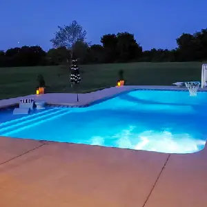Custom-shaped vinyl pool on a polymer wall system