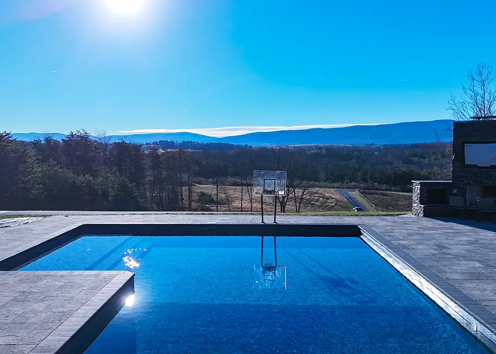Backyard vinyl liner pool built on steel walls