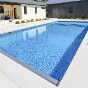 Inground vinyl pool built on a durable steel wall system