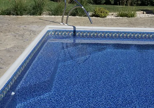 Rectangular vinyl pool built on a Pinnacle Polymer wall system