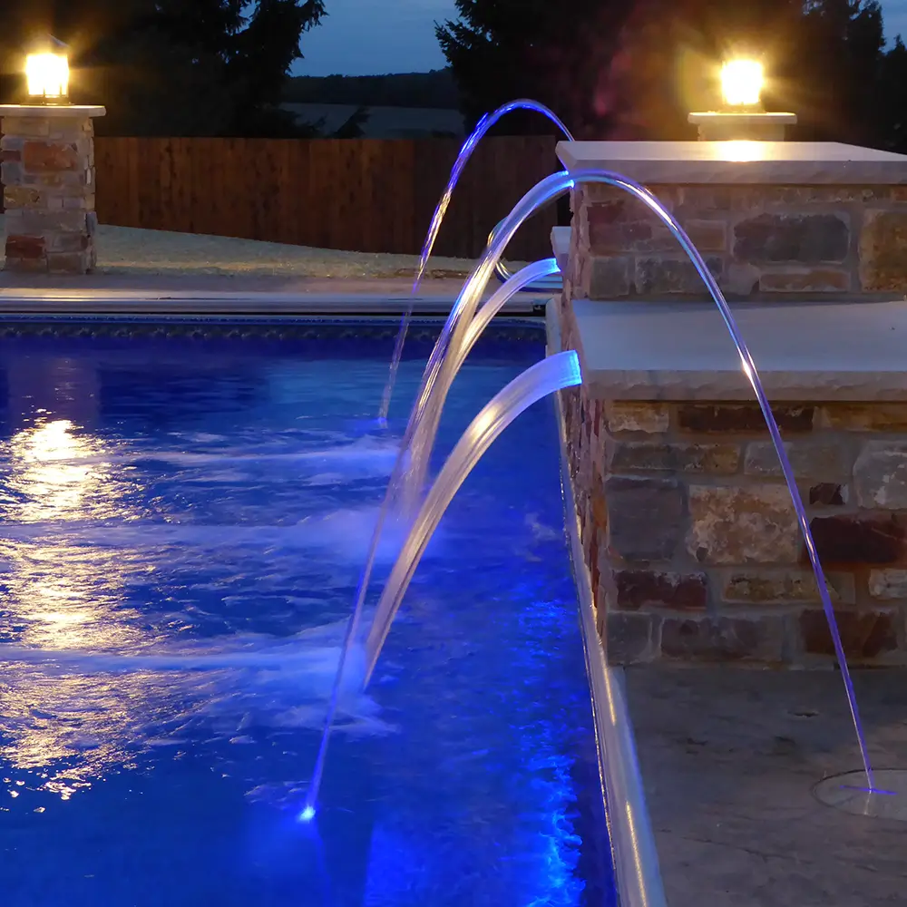 Freeform vinyl pool with a waterfall feature