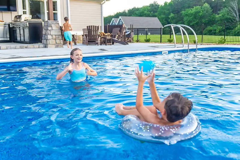 Family enjoying a pool, header image for pool inspiration