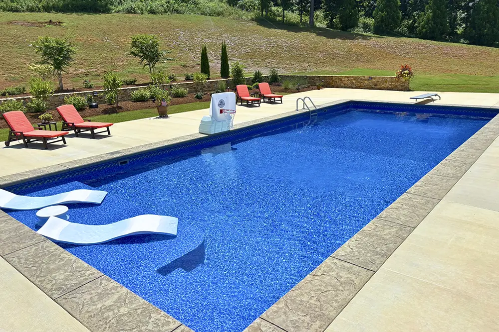 Vinyl-covered steps leading into the shallow end