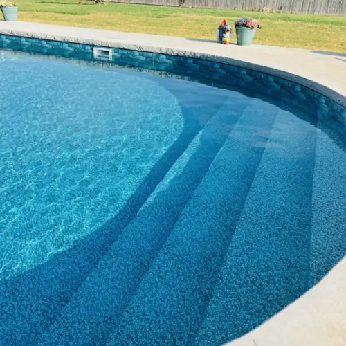 Vinyl-covered steps in a semi-inground pool