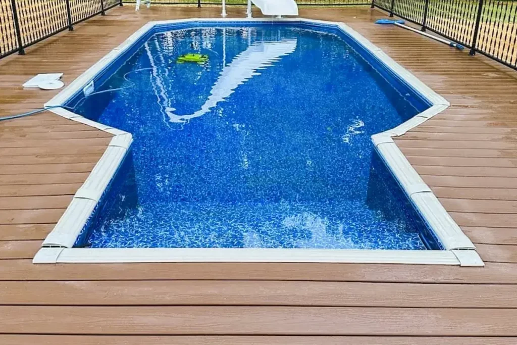Hydra Pools pool photo — semi-inground grecian pool — Skyline, vinyl covered step