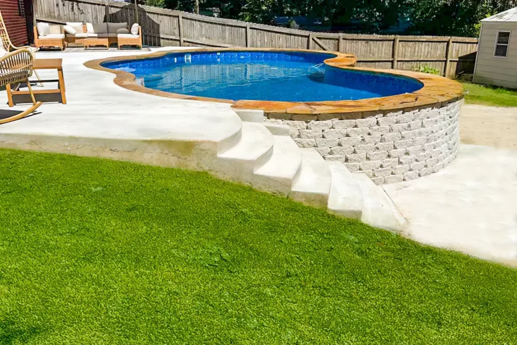 Hydra Pools pool photo — semi-inground lagoon pool — Harmony Hde Blue, vinyl covered step