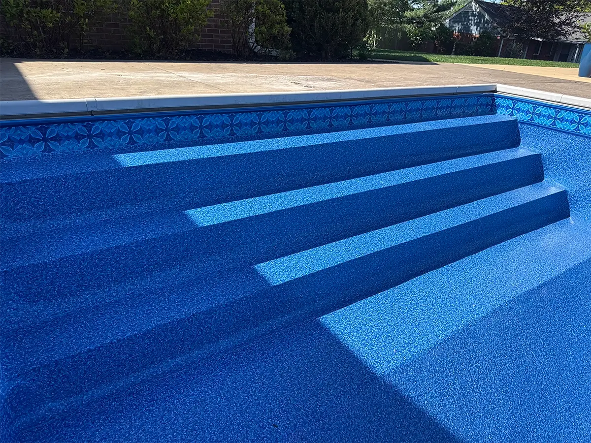 close up of vinyl liner covered vinyl liner pool steps