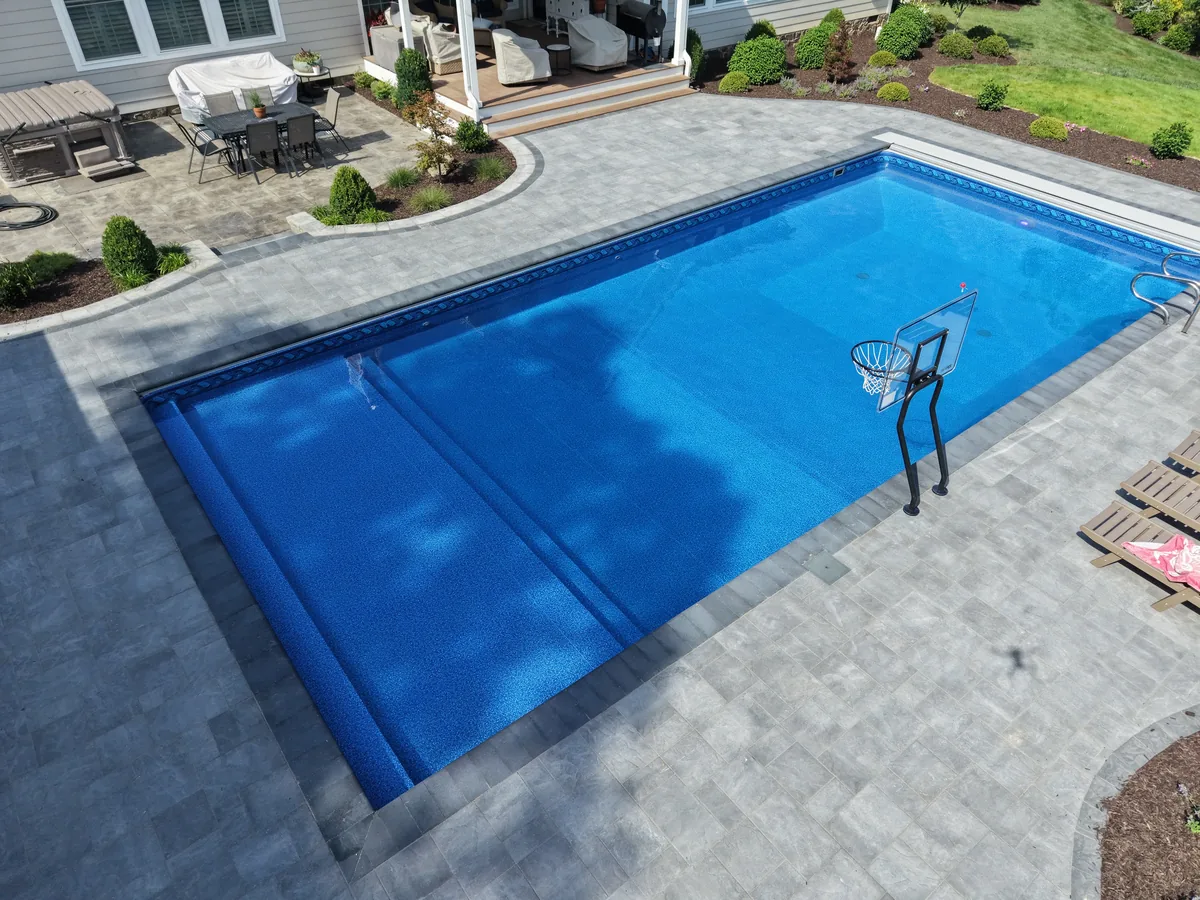 vinyl liner pool with blue raleigh blue beach pebble liner