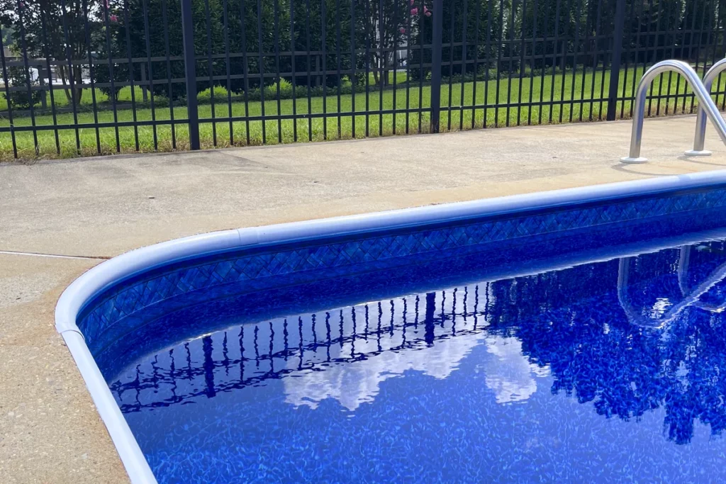 Closeup of Prism Cove Brilliant Blue liner pattern in a rectangle vinyl liner pool